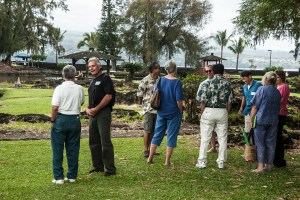 The casual tour wandered over to shade by the bamboo grove..